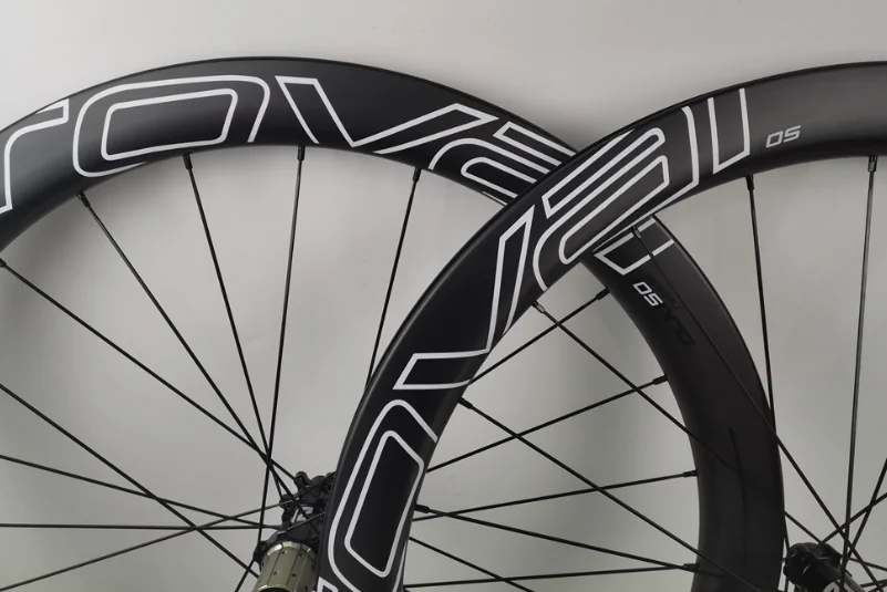 

2021 New carbon wheels clincher tubeless 25mm width thru-axle 12*100 12*142 mm 700c disc brake carbon wheelset with ceramic hubs
