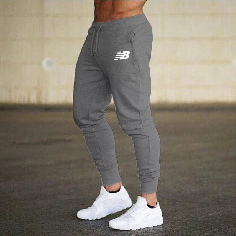 

Joggers Pants Fitness Men Sportswear Tracksuit Bottoms Skinny Sweatpants Trousers 2021Casual New Men's Gyms Jogger Track Pants