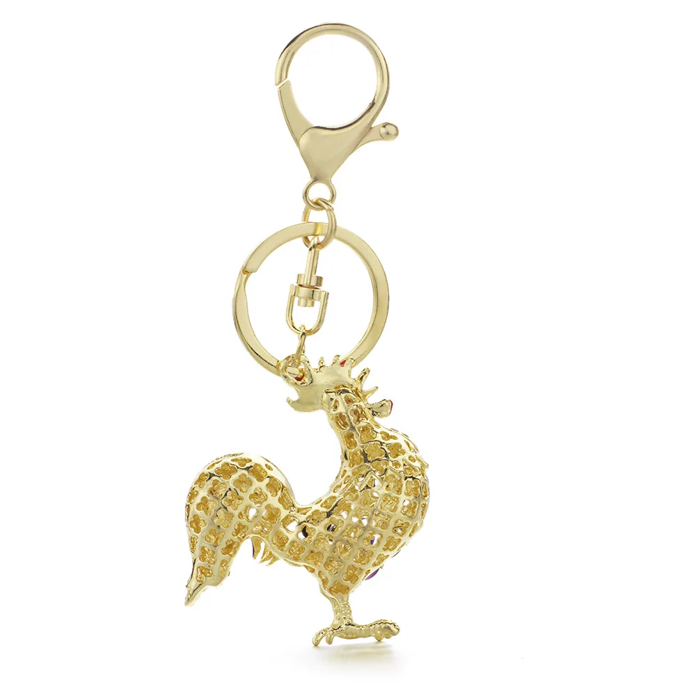 Брелок для ключей DORMON металлическая сумочка с кристаллами петуха из