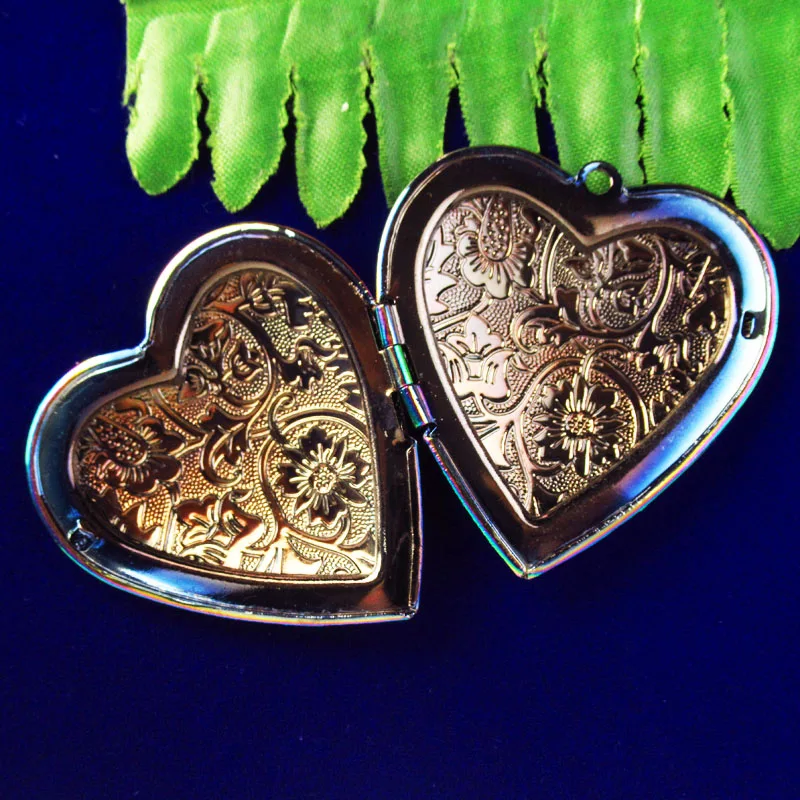 

40x42x10mm Rainbow Hematite Carved Heart Open Design Pendant Bead