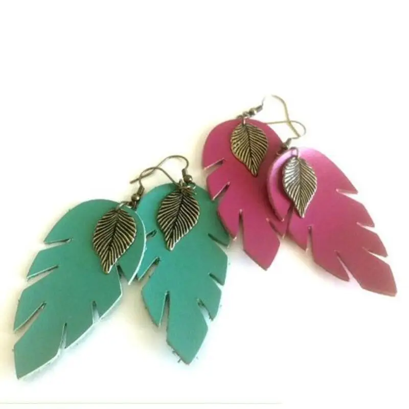 Серьги в виде листьев из японской стали ручная работа декоративная перфорация