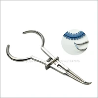 rubber ring placed orthodontic pliers tool clamp forceps orthodonti