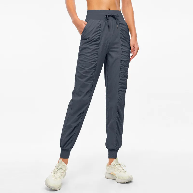 Women Sport Pants Fitness Yoga Legging Natural Folds Quick-drying And Breathable Drawstring Feet Loose Trousers With Pocket