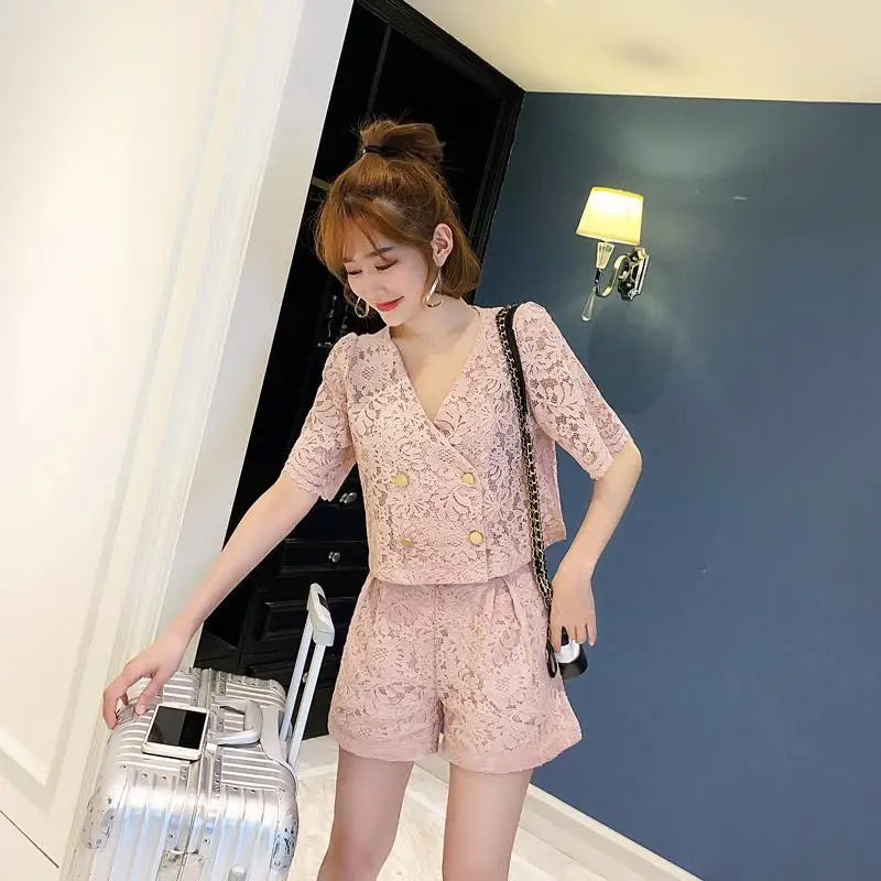

Lace suit women's 2020 new summer women's hollow out foreign style top fashion temperament wide leg shorts two piece set