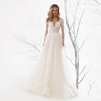 sexy see through wedding dress v neck long sleeves lace appliqued a line long train tulle backless bridal dresses