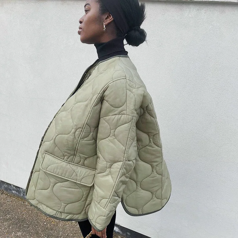 

Autumn and winter 2021 new women's wear solid color temperament commuter button pocket loose coat cotton clothes