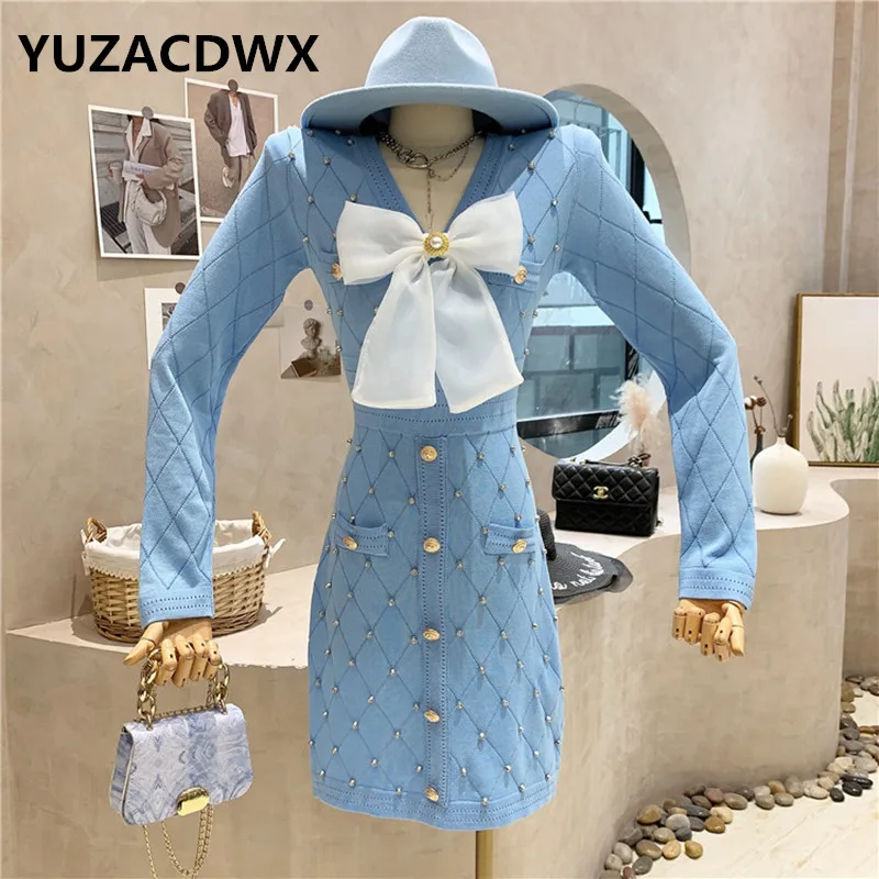 

Женское трикотажное мини-платье с длинным рукавом, V-образным вырезом и большим бантом