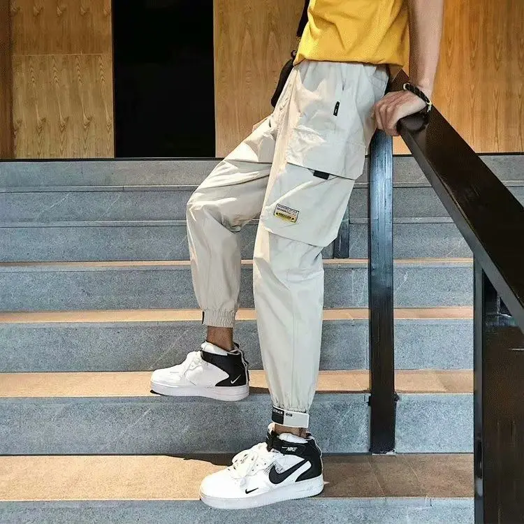

New 2021 Men's Fashion Personality Slim Elasticity Haran Pants Multi Pocket Haran Pants Tootsies Singer Costumes