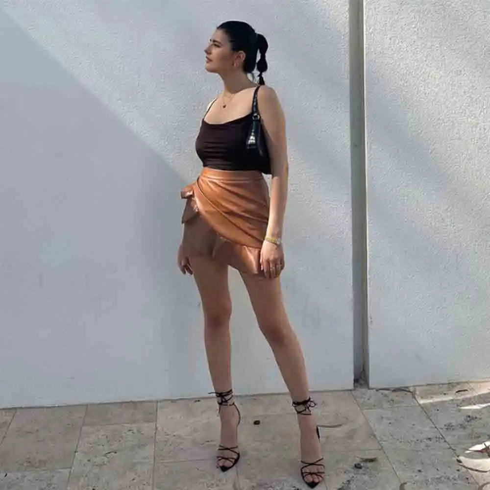 

Faux Leather Mini Skirts Women Ruffles Asymmetry Solid Brown Sexy Skirts Hight Waist Skinny Summer Mini Skirt Female