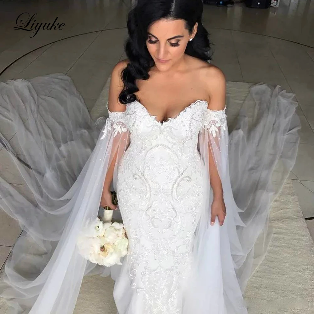 

Liyuke J79 Modest Tulle Strapless Mermaid Wedding Dress With Long Capel Lace Empire Waist Off The Shoulder Bridal Dress