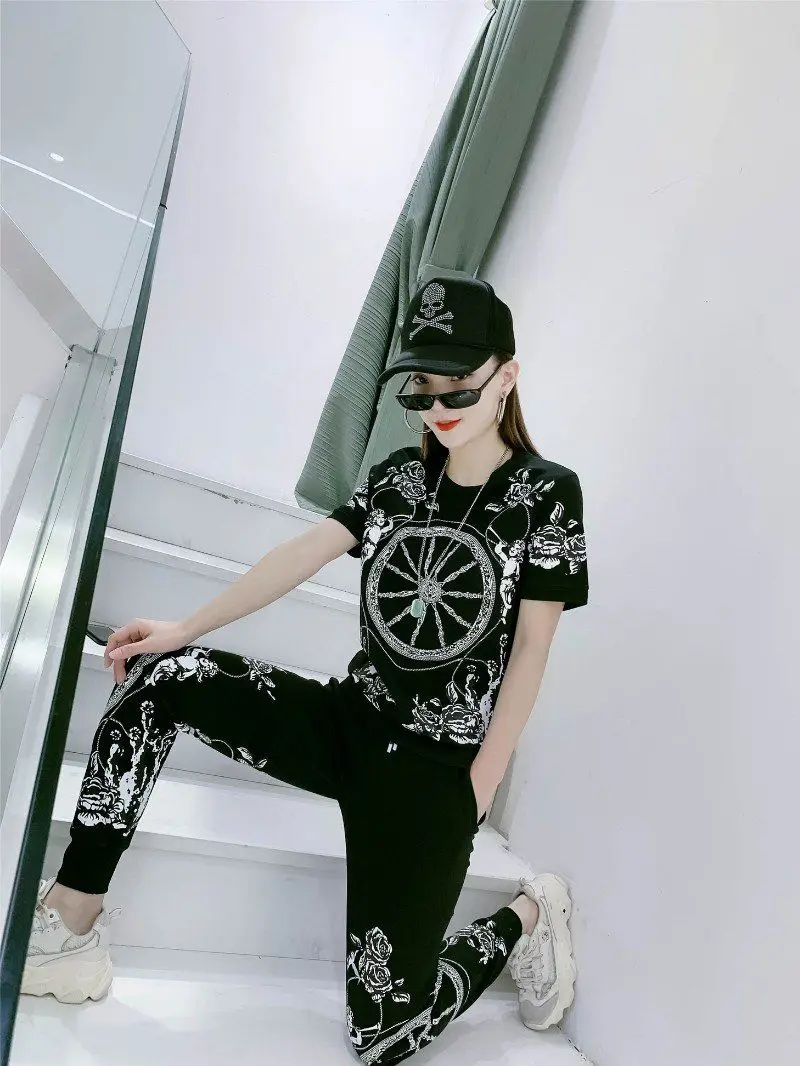 

2021 Summer New Women's Fashion Printing Half-Sleeved Wild Travel Vacation Sports And Leisure Two-Piece Suit