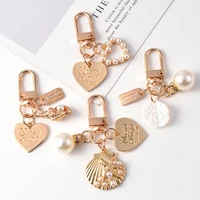 luxury shell pearl keychain for apple airpods case bluetooth earphone accessories fashion keychains women keychain for car keys