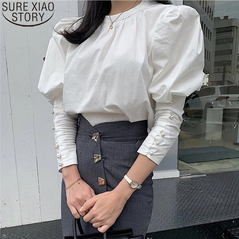 

2021 New Fashion White Puff Sleeve Blouse Women Korean Street Solid Casual Long Sleeve Round Neck Temperament Shirt tops 12543