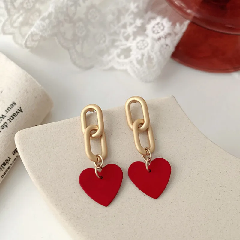 

Love Heart Pendant Earrings Bowknot Temperament Ear Studs