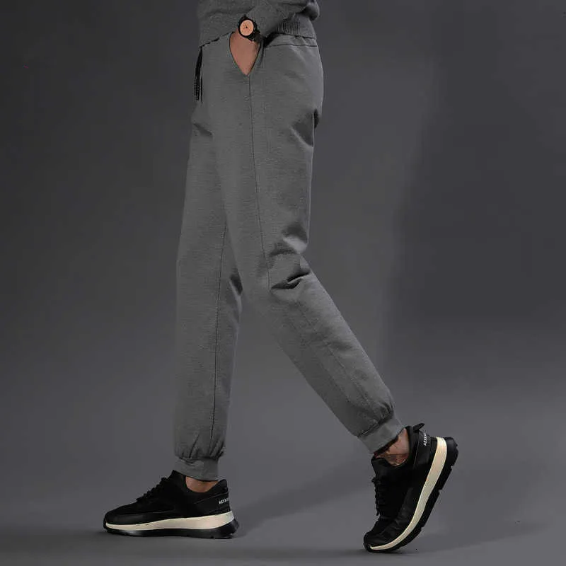 Зимние мужские пуховые брюки утепленные теплые штаны на 90% белом утином пуху