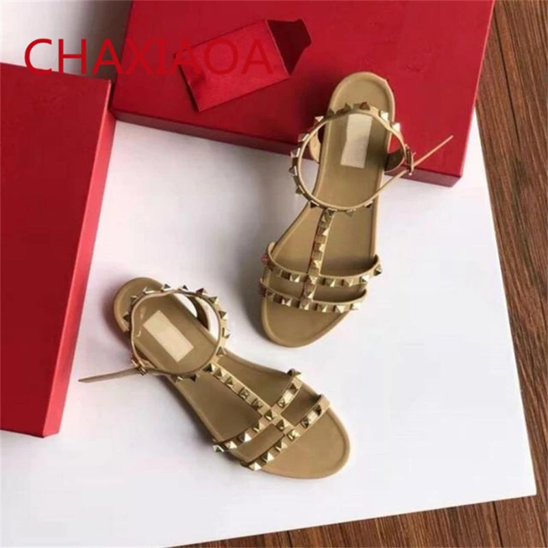 

CHAXIAOA Gold Rivets Fashion Flats Sandals Ladies Buckle Strap Leather Women's Summer Trend Shoes 2021 Female Gladiator Sandals
