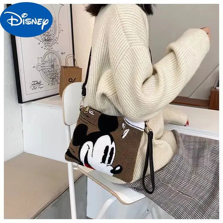 

Disney autumn and winter new clutch bag shoulder messenger bag portable female bag envelope bag fashion cartoon small square bag