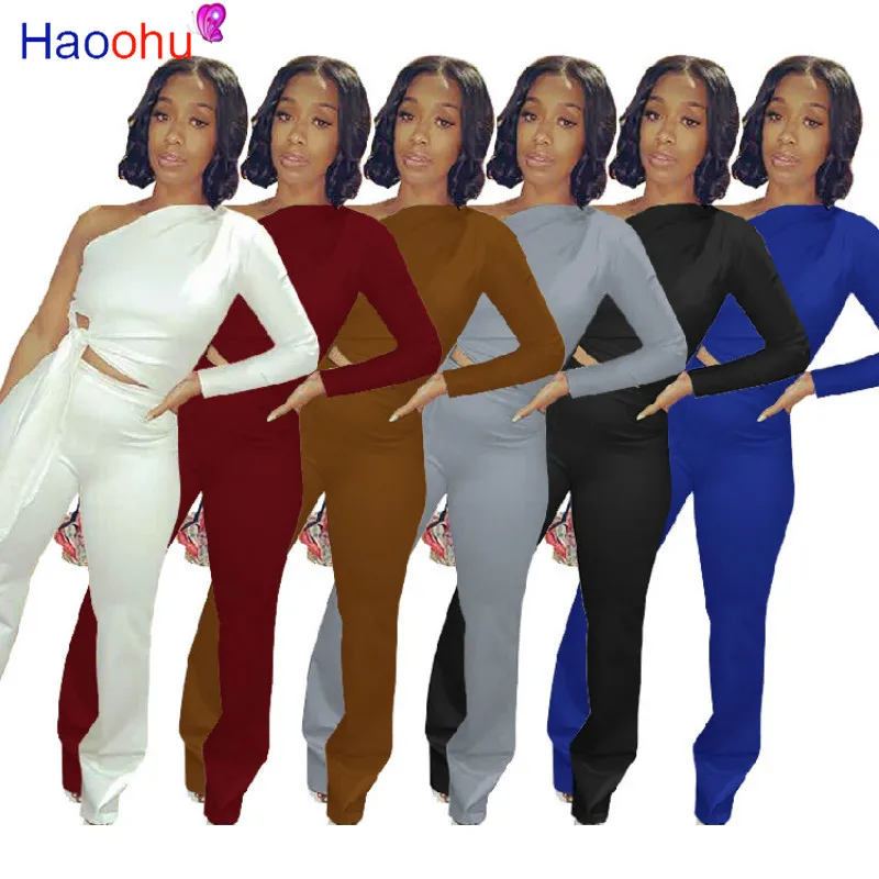 

Женский офисный спортивный костюм HAOOHU из двух предметов, женская одежда, укороченный топ на одно плечо с длинным рукавом и расклешенные брю...
