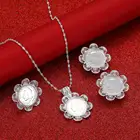 Комплект ювелирных изделий серебристого цвета с подвеской, серьгами и кольцом