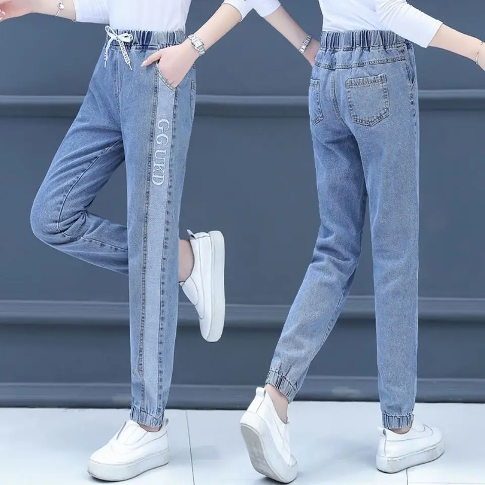 

Thin stretch jeans women's spring and summer Korean loose Capris show thin elastic waist Harlan radish daddy pants