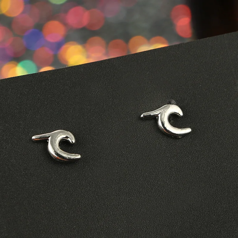 

Fashion Simple Wind Wave Geometric Alloy Metal Spray Stud Earrings