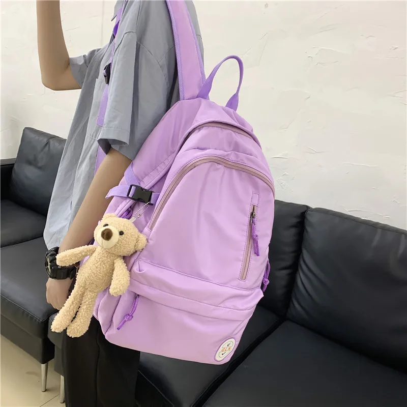 

Casual Vertical Zipper Solid Color Nylon Women Backpack Simple Couple Backpacks Travel Large School Bags for Teenage Girls 2021