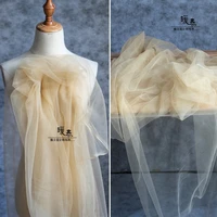 pearlescent tulle fabric faint yellow diy scarf veil flower background decor skirt lace gown wedding dress designer fabric