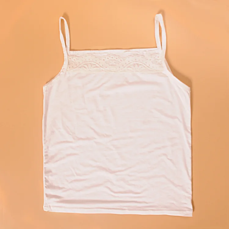 White black sling fitted with a solid-colored collarlace vest bottom shirt |