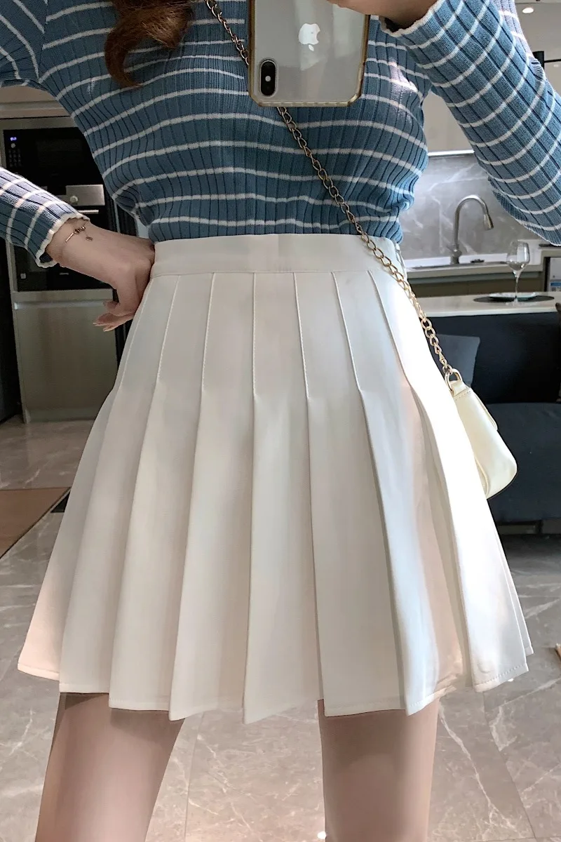 

Spring 2021 new pleated short skirt high waist pure color college fashion show thin skirt women's dress bag hip A-line skirt