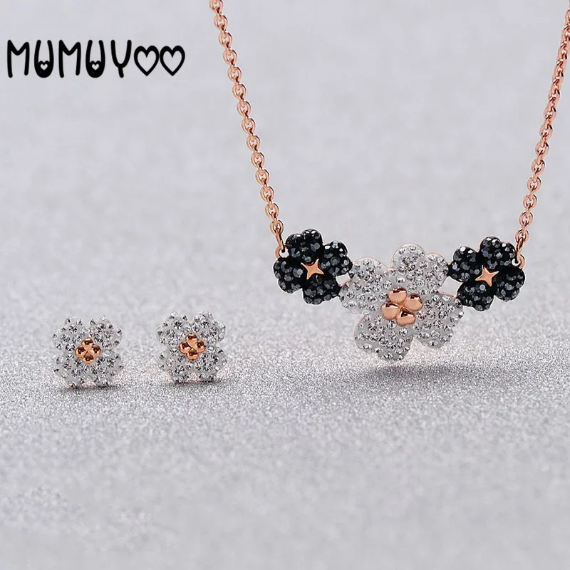 

Fashion Jewels 2020 New charm Rose Gold Black and White Four-Leaf Flower Necklace For Women.