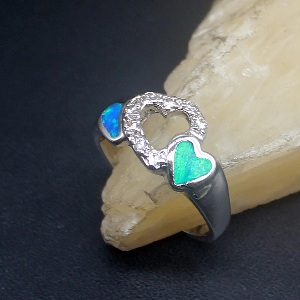 

Женское кольцо из серебра 925 пробы с натуральным голубым опалом, размеры 8 #20214262