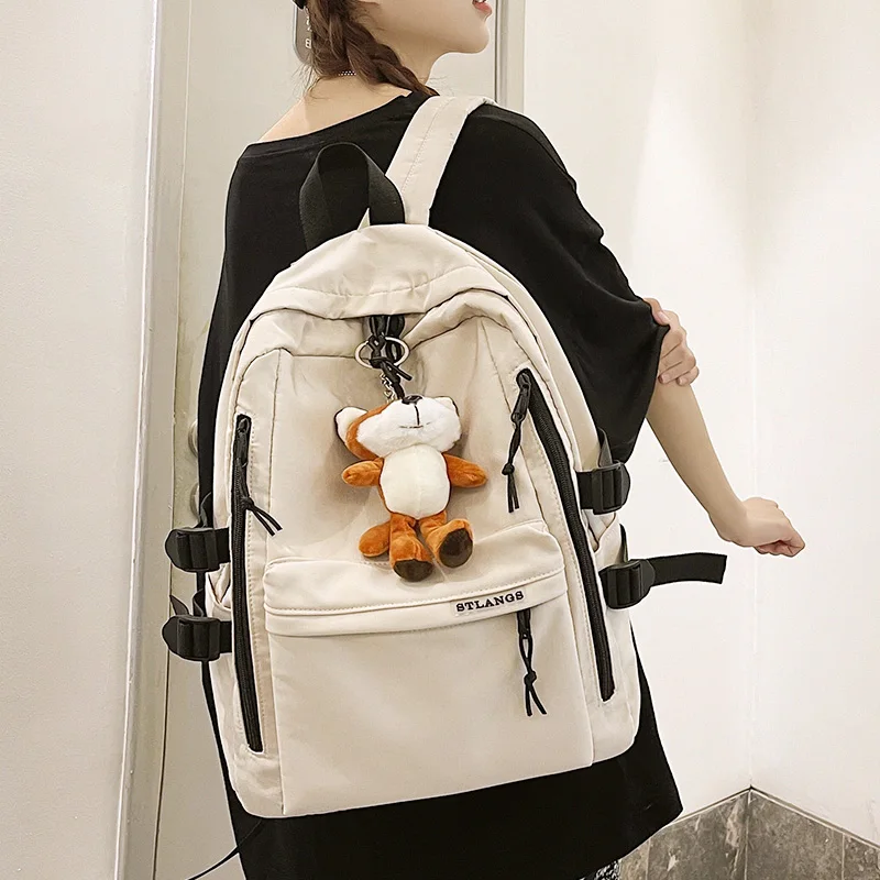 

Unisex large capacity solid color backpack Fashion couple travel nylon backpack College students, schoolbags, men's and women's