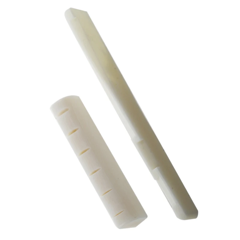 

2 x guitar strings pillow top and bottom bone bridge