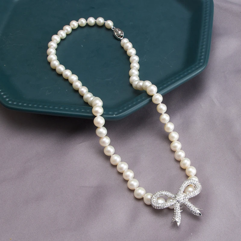 

Micro-inlaid zircon and copper-plated bow close-round pearl necklace 210326-45