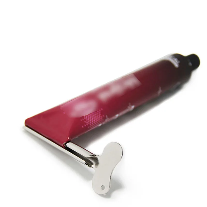 Специальный инструмент для выдавливания пасты парикмахерских горячего