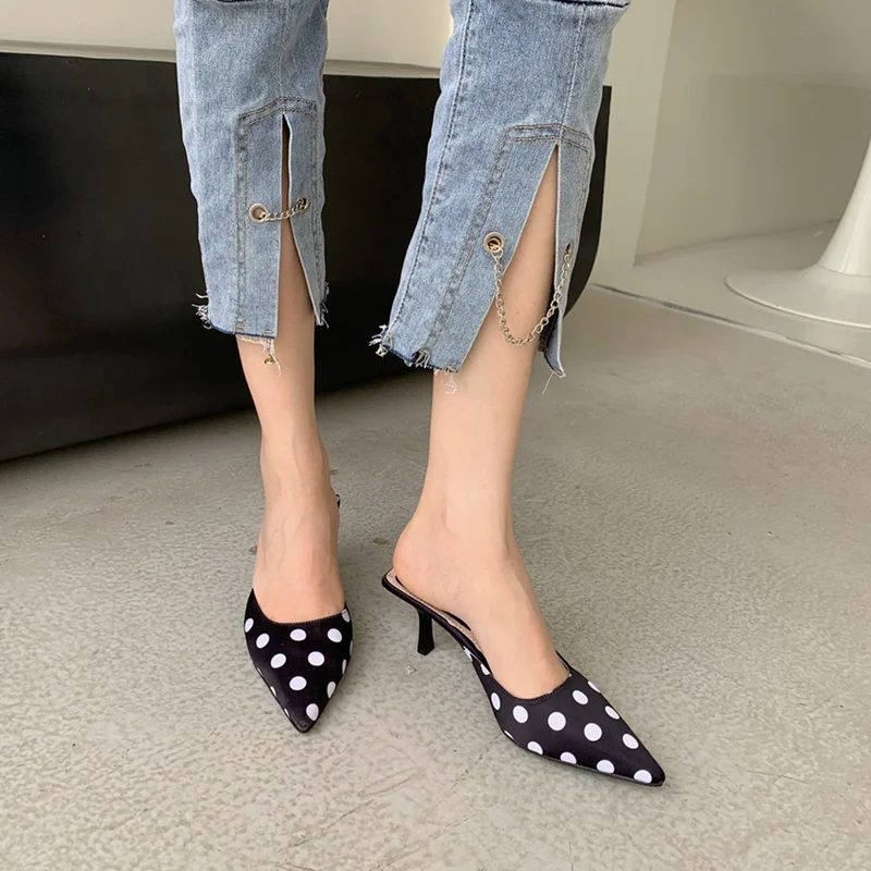 

2021 spring and summer black and white polka dot sexy Baotou high-heeled ladies half-drag all-match sandals pointed toe mules