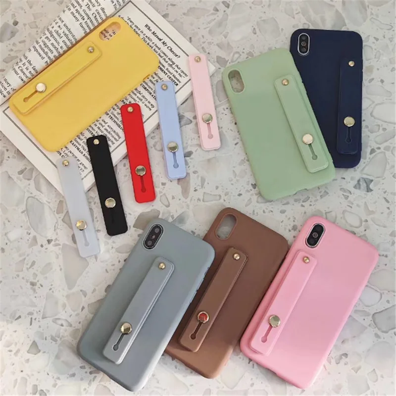 24pcslot wrist band hand band finger grip mobile phone holder stand push pull universal phone socket holder for iphone xiaomi free global shipping