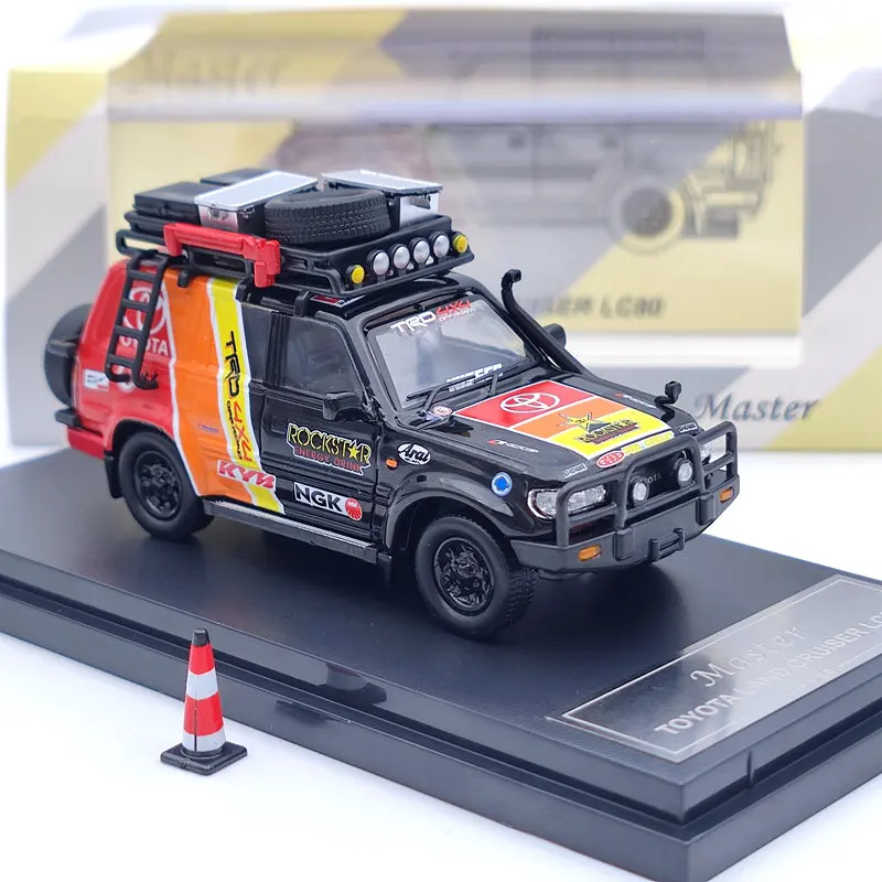 Коллекция автомобилей Master TO ~ TA LAND CRUISER LC80 NGK модели с багажной полкой 1:64 |