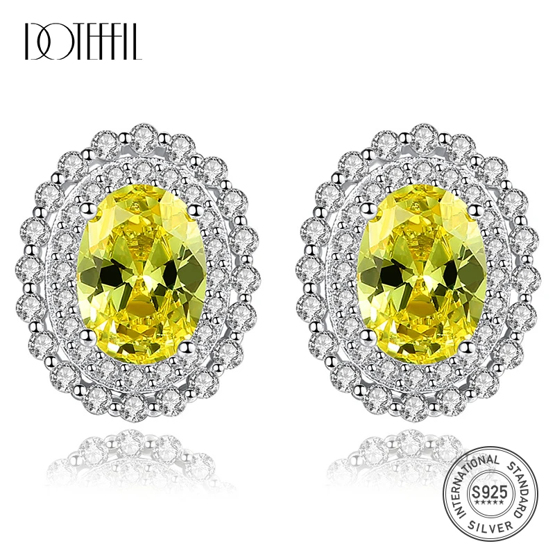 Женские серьги гвоздики с крупным желтым овальным топазом серебро 925