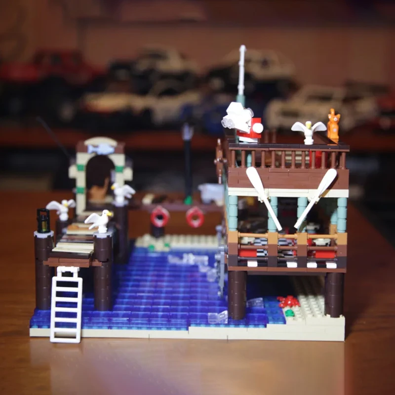 

Creator UG-30101 Old Fishing House Pier Set Building Blocks 1402pcs Bricks Educational Toy Child Birthday Gifts 16050