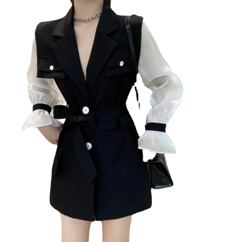 

Korean suit women's autumn new medium and long waist, foreign style trumpet sleeves and fake two-piece suit collar trench coat