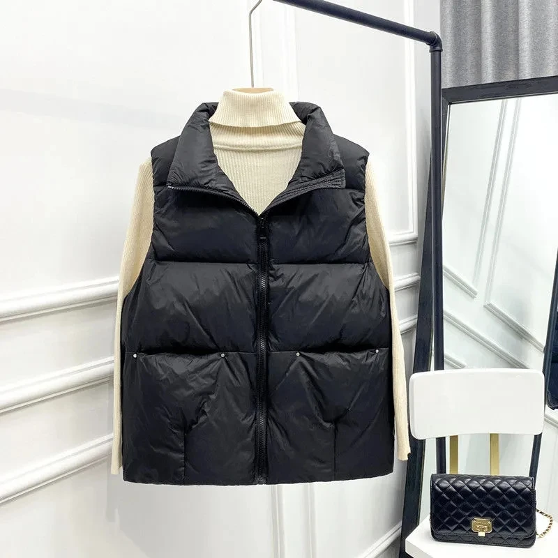 Женский сверхлегкий жилет на 90% утином пуху новый мягкий без рукавов осень и зиму