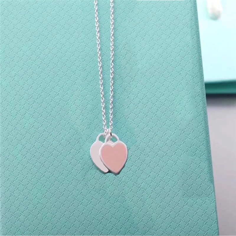 

S925 double heart-shaped sterling silver necklace. Heart-to-heart. Gifts for lovers.