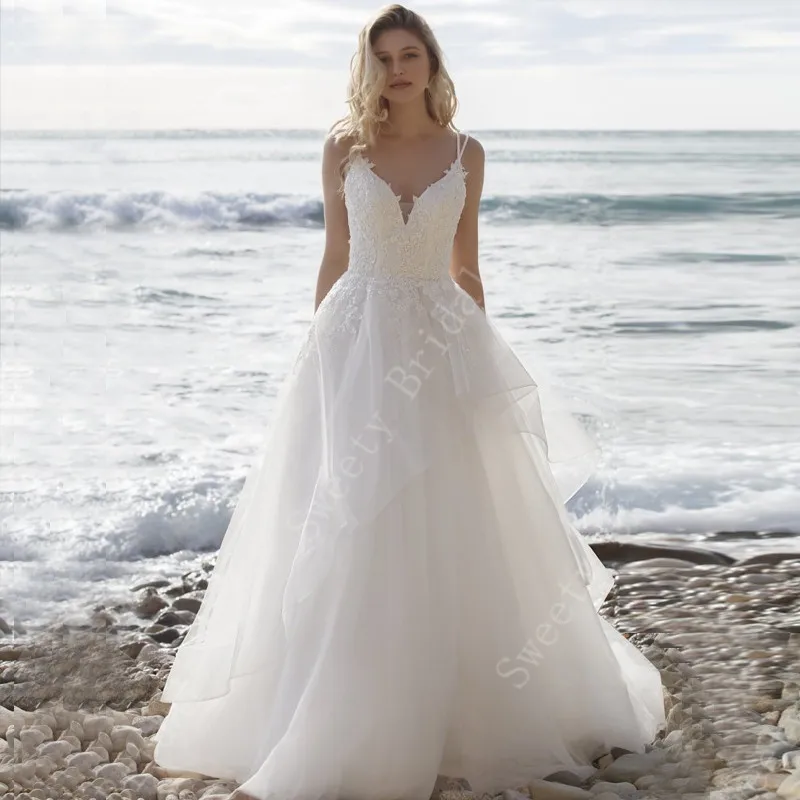 

Beach Wedding Dresses 2021 V Neck Spaghetti Straps Lace Appliques Boho Bridal Gowns Open Back Vestido De Noiva Sweep Train