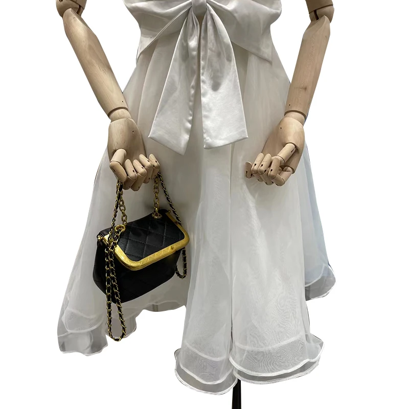 

TWOTWINSTYLE Sweet White Patchwork Bowknot Dress For Women Half High Collar Sleeveless High Waist Midi Dresses Female 2021 Style