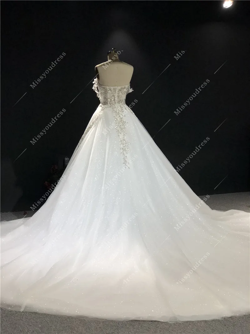 2021 Newest High Quality Real Sample Ivory Sweetheart Strapless A-line Heavy Silver Beadings Floor Length Wedding Dress