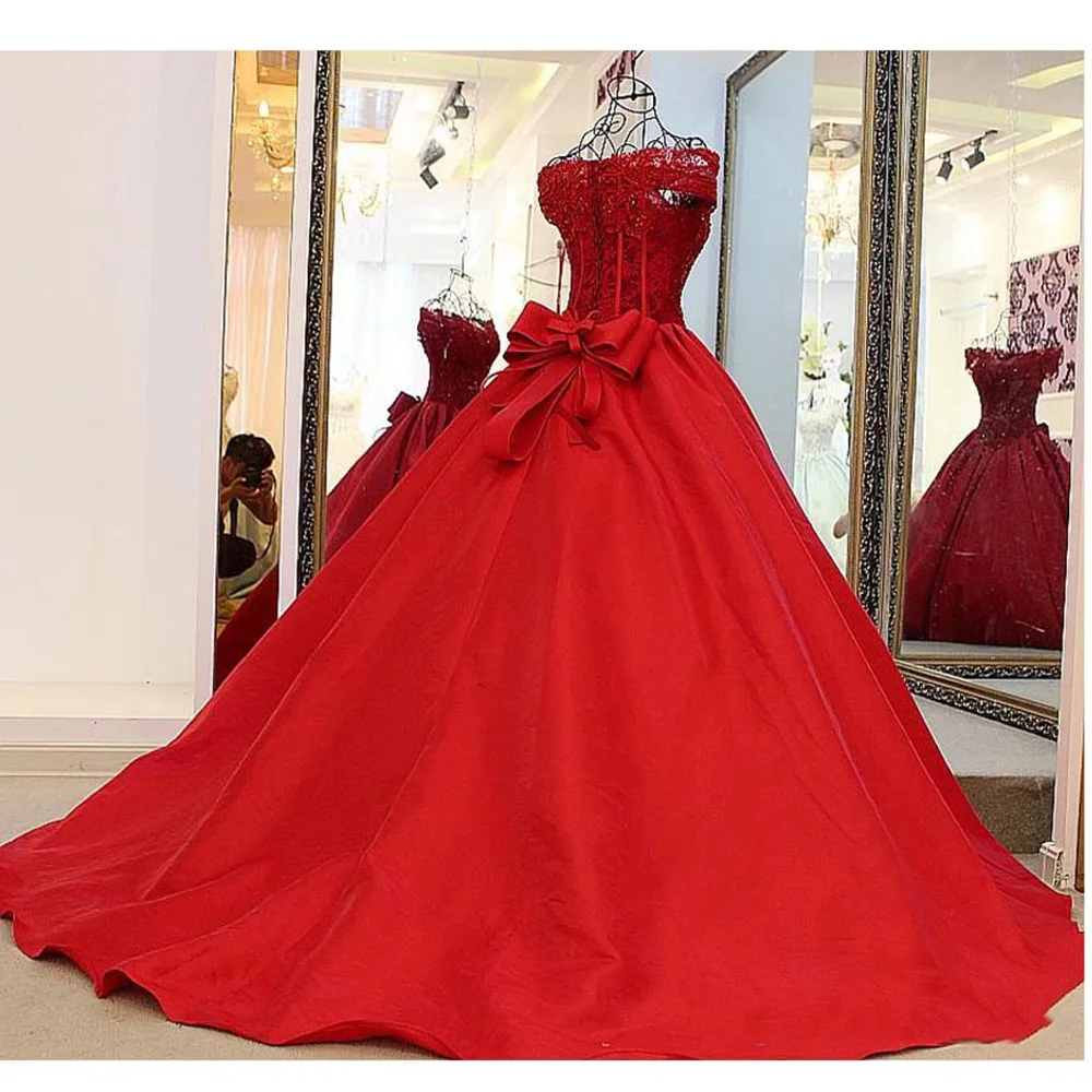 Red Vintage Puffy Ball Gowns V-neck Beaded Bow Saudi Arabic Prom Dresses Appliques Lace Up Formal Party Dress Robe De Soiree