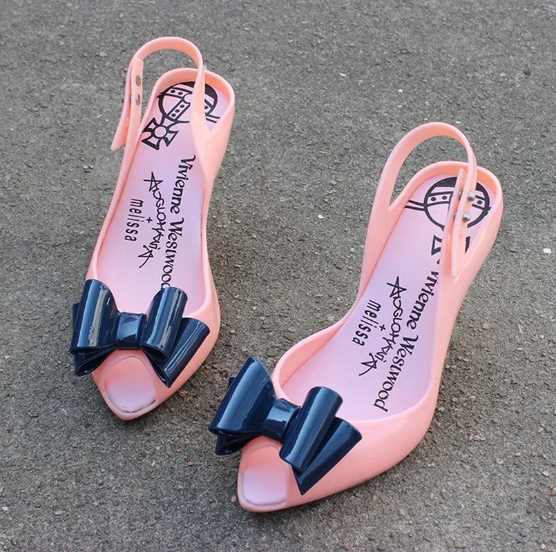 Женские туфли лодочки на высоком каблуке с открытым носком и украшением в виде