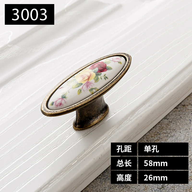 

Винтажная керамическая ручка белая и бронзовая