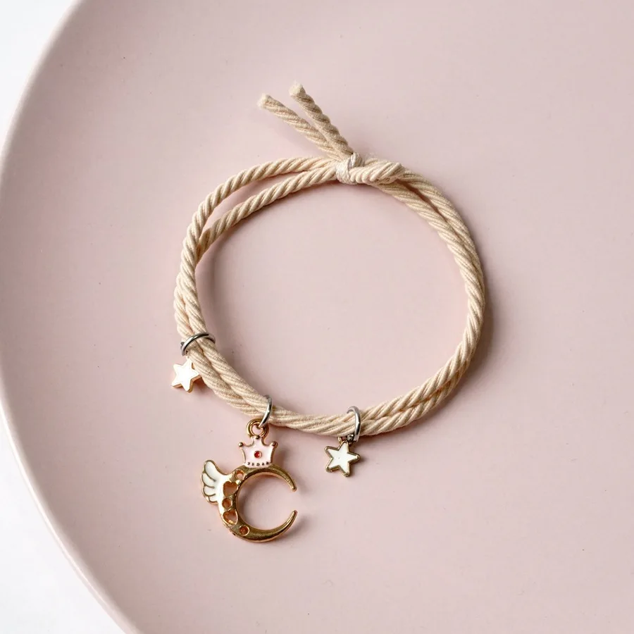 

Simple wing hair ROPE BRACELET MULTI PURPOSE female hair tie rubber band star head rope female net red hair ring